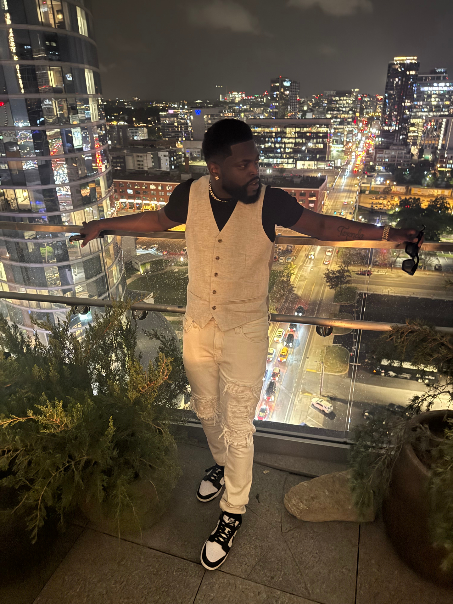 Donte Tyree Smith — Founder & CEO of UPM Marketing, on a Chicago rooftop at night